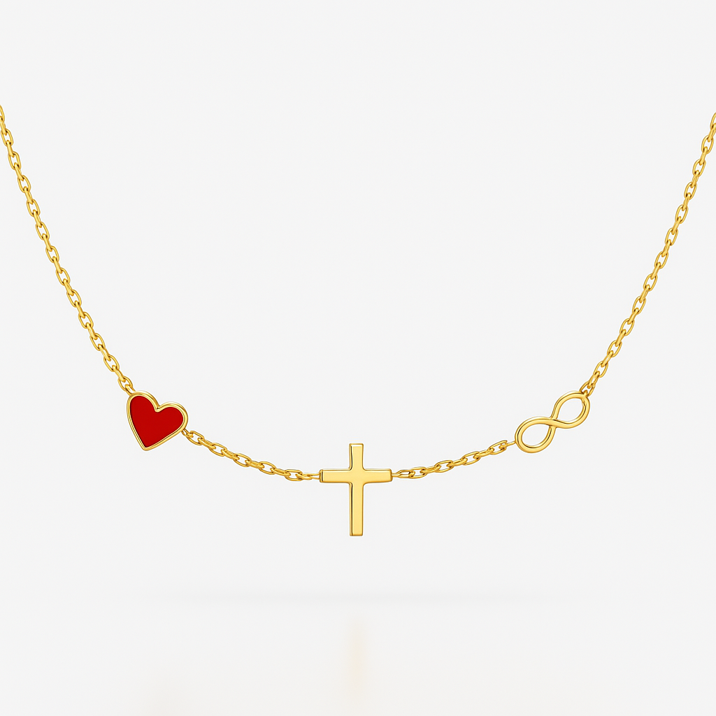 Gold necklace with a red heart, cross, and infinity symbol on a white background