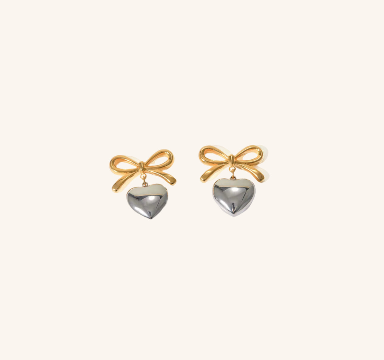 Meaning christian earrings; heart with bow