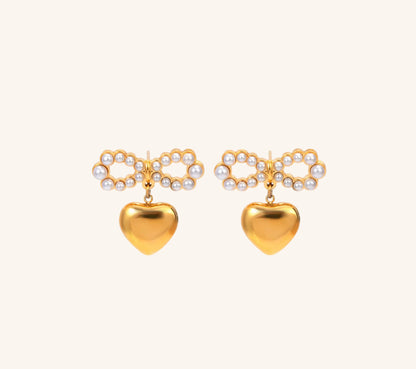 faith-based earrings reminding us to love like Jesus with pearls for elegance.